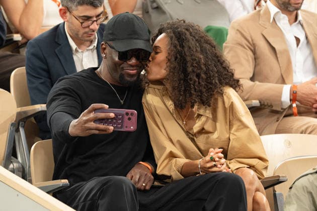 Celebs in the tribunes at Roland Garros 2026 - Paris LZ Blondy Baruti and his wife Cindy Bruna attend the 10rd day of the Roland-Garros 2026 at Roland Garros on June 2, 2026 in Paris, France. Photo by Laurent Zabulon ABACAPRESS.COM  Copyright: xZabulonxLaurent ABACAx