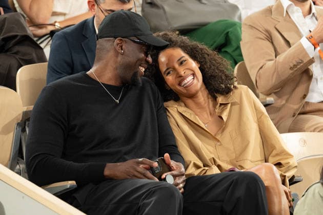 Celebs in the tribunes at Roland Garros 2026 - Paris LZ Blondy Baruti and his wife Cindy Bruna attend the 10rd day of the Roland-Garros 2026 at Roland Garros on June 2, 2026 in Paris, France. Photo by Laurent Zabulon ABACAPRESS.COM  Copyright: xZabulonxLaurent ABACAx