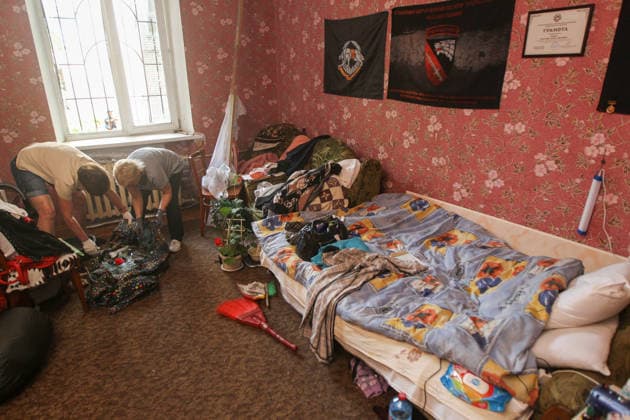 Two women in gloves remove glass shards from the living room in a nine-storey apartment block hit by a Russian drone in Dnipro, Ukraine, on 2 June 2026. During the day, Russian occupation forces carried out another strike on the city, targeting a block of flats with a jet drone. As a result of the direct hit, one apartment burned to the ground, and neighbouring flats also sustained significant damage. Two children were injured and taken to the hospital with moderate injuries. (Photo by Mykola Miakshykov Ukrinform) Russian drone strikes block of flats in Dnipro  Copyright: xMykolaxMiakshykovx