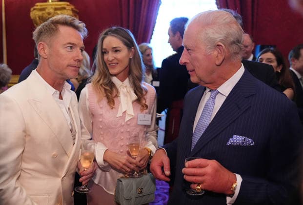 . 02 06 2026. London, United Kingdom. King Charles III speaks to Singer Ronan Keating and his wife Storm at a reception to mark the 125th anniversary of Cancer Research UK at St.JamesÕs Palace in London.  xPoolx xi-Imagesx IIM-26802-0056