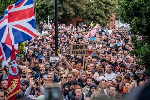 June 2, 2026, London, United Kingdom: Protestors outside Southampton Central Police Station hold placards during the rally. Southampton locals organized a flash protest following the release of Police body-cam footage of the arrest and subsequent death of Henry Nowak. The 18 year old was handcuffed by Hampshire Constabulary who accused him of racial abuse and did not believe that he had been stabbed. He subsequently bled to death in custody. The protest outside Southampton Central Police Station accused the government of 2 tier policing. London United Kingdom - ZUMAs197 20260602_aaa_s197_080 Copyright: xLabxMox