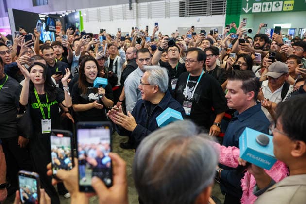 NVIDIA s CEO Jensen Huang visits COMPUTEX TAIPEI 2026 TAIPEI, TAIWAN - JUNE 3: Jensen Huang, the CEO of American multinational tech giant NVIDIA, applaud as he is surrounded by heaps of supporters and staff during his visit to the COMPUTEX TAIPEI trade show, in Taipei, Taiwan, on June 3, 2026. COMPUTEX TAIPEI is one of the world’s largest and most significant trade shows, featuring latest technologies, drones, data centres, Artificial Intelligence (AI) technologies, supercomputers, semiconductors products and other things from major international firms such as Nvidia, Intel, NXP and Foxconn. Daniel Ceng Anadolu Taipei Taiwan. Editorial use only. Please get in touch for any other usage.  Copyright: x2026xAnadoluxDanielxCengx