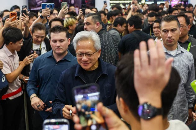 NVIDIA s CEO Jensen Huang visits COMPUTEX TAIPEI 2026 TAIPEI, TAIWAN - JUNE 3: Jensen Huang, the CEO of American multinational tech giant NVIDIA, is surrounded by heaps of supporters and staff during his visit to the COMPUTEX TAIPEI trade show, in Taipei, Taiwan, on June 3, 2026. COMPUTEX TAIPEI is one of the world’s largest and most significant trade shows, featuring latest technologies, drones, data centres, Artificial Intelligence (AI) technologies, supercomputers, semiconductors products and other things from major international firms such as Nvidia, Intel, NXP and Foxconn. Daniel Ceng Anadolu Taipei Taiwan. Editorial use only. Please get in touch for any other usage.  Copyright: x2026xAnadoluxDanielxCengx