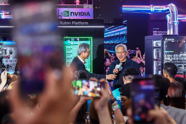 NVIDIA s CEO Jensen Huang visits COMPUTEX TAIPEI 2026 TAIPEI, TAIWAN - JUNE 3: Jensen Huang, the CEO of American multinational tech giant NVIDIA, is surrounded by heaps of supporters and staff during his visit to the COMPUTEX TAIPEI trade show, in Taipei, Taiwan, on June 3, 2026. COMPUTEX TAIPEI is one of the world’s largest and most significant trade shows, featuring latest technologies, drones, data centres, Artificial Intelligence (AI) technologies, supercomputers, semiconductors products and other things from major international firms such as Nvidia, Intel, NXP and Foxconn. Daniel Ceng Anadolu Taipei Taiwan. Editorial use only. Please get in touch for any other usage.  Copyright: x2026xAnadoluxDanielxCengx