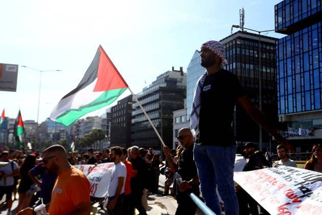 June 3, 2026, Piraeus, Greece: Demonstrators gather at the port of Piraeus to protest the arrival of a cruise ship carrying Israeli tourists. Protesters expressed solidarity with Palestinians and opposition to IsraelÃ¢â‚¬â ¢s military operations in Gaza, holding banners and chanting slogans as the vessel docked in GreeceÃ¢â‚¬â ¢s largest port. Piraeus Greece - ZUMAv62_ 20260603_zaf_v62_017 Copyright: xAristidisxVafeiadakisx