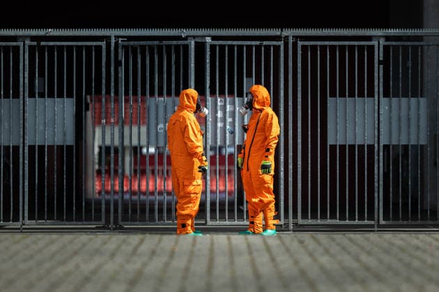 resConEx 2026 am 03.06.2026 im RheinEnergieStadion in Köln Personen im Schutzanzug vor dem Stadion *** resConEx 2026 on 03 06 2026 at the RheinEnergieStadion in Cologne People in protective suits in front of the stadium xJRx