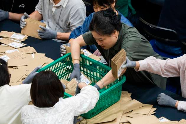 June 3, 2026, Seoul, South Korea: Poll workers sort mail-in ballots after the conclusion of voting in South KoreaÃ¢â‚¬â ¢s local elections on Wednesday, June 3, 2026 in Seoul, South Korea. Seoul South Korea  - ZUMAh163 20260603_znp_h163_023 Copyright: xJintakxHanx