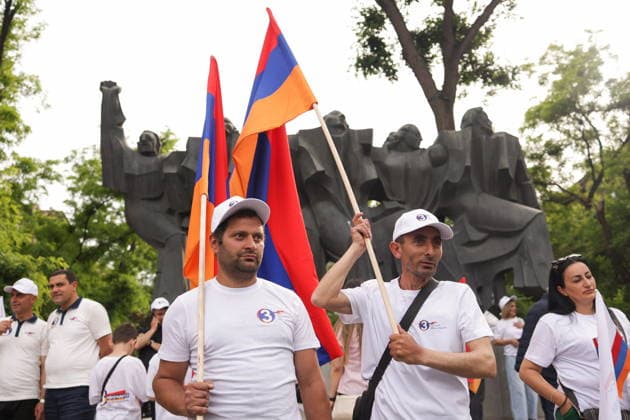 ARMENIA, YEREVAN - JUNE 3, 2026: Activists gather near the Mountain Dance sculptural group in Mergelyan Park to rally for Strong Armenia ahead of the June 7 election to the National Assembly Yerevan Armenia  - ZUMAt113 20260603_zaa_t113_600 Copyright: xAlexanderxPatrinx