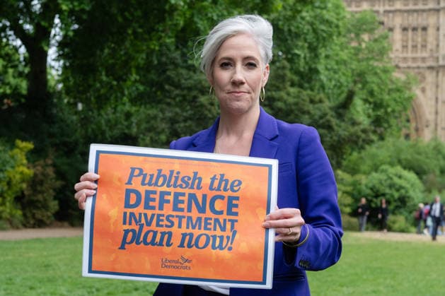 June 3, 2026, London, England, United Kingdom: DAISY COOPER, Deputy Leader of the Liberal Democrats and Liberal Democrat Treasury spokesperson, holds a placard as Liberal Democrat MPs stage a rally in Westminster calling on the Government to publish the delayed Defence Investment Plan and back proposals for Defence Bonds, following the anniversary of the Strategic Defence Review s publication. London United Kingdom  - ZUMAk172 20260603_zip_k172_017 Copyright: xThomasxKrychx