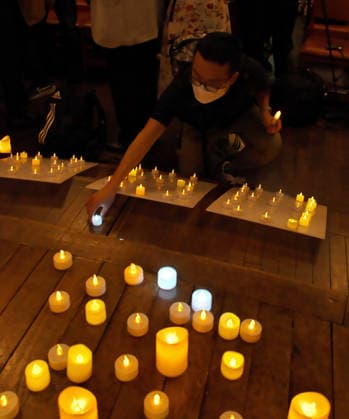 Participant places LED candle in remembrance during the rally to mark the 37th anniversary of the Chinese military crackdown on the pro-democracy movement in Beijing s Tiananmen Square at the chapel of the Waseda Hoshien in Tokyo, Japan on Wednesday, June 3, 2026.  TKP2026060314 KEIZOxMORI