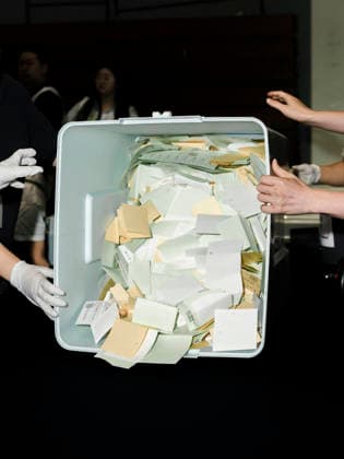 June 3, 2026, Seoul, Seoul, South Korea: Election workers open ballot boxes and pour ballots onto counting tables at a vote-counting center following South Korea s nationwide local elections on June 3. Voters elected mayors, governors, local council members and regional education superintendents. Seoul South Korea - ZUMAm346 20260603_znp_m346_012 Copyright: xSuhxJeenxMoonx