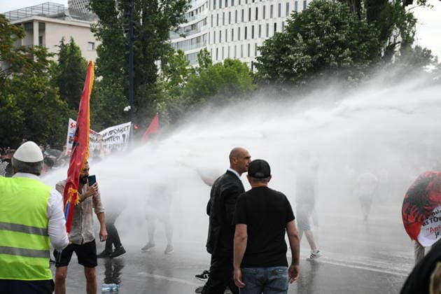 Police use water cannons to disperse protesters at a demonstration against a tourism project in Albania TIRANA, ALBANIA - JUNE 3: Police use water cannons against the protesters during a protest against a planned tourism project in the Zvernec area of the city of Avlonya (Vlora) as people gather on the Boulevard of the Nation’s Martyrs in Tirana, Albania on June 3, 2026. People protest the sale of a stretch of coastline in Zvernec as part of a tourism project reportedly linked to U.S. President Donald Trump’s daughter, Ivanka Trump, and her husband, Jared Kushner. Olsi Shehu Anadolu Tirana Albania. Editorial use only. Please get in touch for any other usage.  Copyright: x2026xAnadoluxOlsixShehux