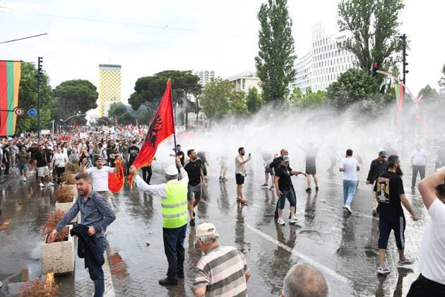 Police use water cannons to disperse protesters at a demonstration against a tourism project in Albania TIRANA, ALBANIA - JUNE 3: Police use water cannons against the protesters during a protest against a planned tourism project in the Zvernec area of the city of Avlonya (Vlora) as people gather on the Boulevard of the Nation’s Martyrs in Tirana, Albania on June 3, 2026. People protest the sale of a stretch of coastline in Zvernec as part of a tourism project reportedly linked to U.S. President Donald Trump’s daughter, Ivanka Trump, and her husband, Jared Kushner. Olsi Shehu Anadolu Tirana Albania. Editorial use only. Please get in touch for any other usage.  Copyright: x2026xAnadoluxOlsixShehux