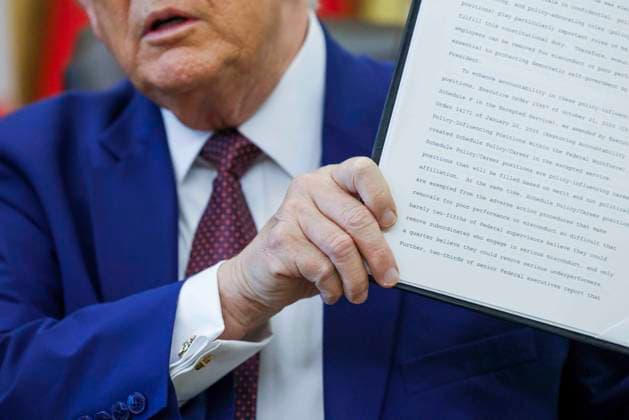 US President Donald J. Trump takes questions from the news media during an executive order signing ceremony US President Donald J. Trump signs an executive order during a ceremony in the Oval Office of the White House in Washington, DC, USA, 03 June 2026. President Trump signed executive orders on the federal workforce and immigration. WASHINGTON DISTRICT OF COLUMBIA United States  Copyright: xPool ABACAx