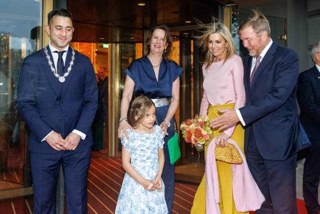 The Netherlands, 2026-06-03 20:29:51 NLD Amsterdam 20260603 - Royal Couple at the opening of the Holland Festival. In the photo: King Willem-Alexander and Queen Maxima - Greeting outside the main entrance by Emily Ansenk, Director of the Holland Festival. H.M. the Queen is presented with a hand bouquet by Alma Valkenburg (7 years old), daughter of Music & Music Theatre Program Manager Jochem Valkenburg.  Copyright: xx x