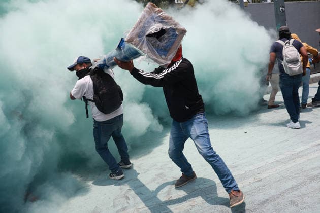 CNTE teachers hold third day of protests in Mexico City after declaring indefinite national strike MEXICO CITY, MEXICO - JUNE 03: Demonstrators attempt to breach the gates of the Mexico s Education Ministry building as riot police discharge fire extinguishers at them during a protest by CNTE teachers, in Mexico City, Mexico on June 03, 2026. Members of National Coordination of Education Workers (CNTE) forced their way into Mexico s Education Ministry building, causing damage to the facilities, as part of the third day of protests following the declaration of a national strike. Daniel Cardenas Anadolu Mexico City Mexico. Editorial use only. Please get in touch for any other usage.  Copyright: x2026xAnadoluxDanielxCardenasx