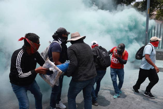 CNTE teachers hold third day of protests in Mexico City after declaring indefinite national strike MEXICO CITY, MEXICO - JUNE 03: Demonstrators attempt to breach the gates of the Mexico s Education Ministry building as riot police discharge fire extinguishers at them during a protest by CNTE teachers, in Mexico City, Mexico on June 03, 2026. Members of National Coordination of Education Workers (CNTE) forced their way into Mexico s Education Ministry building, causing damage to the facilities, as part of the third day of protests following the declaration of a national strike. Daniel Cardenas Anadolu Mexico City Mexico. Editorial use only. Please get in touch for any other usage.  Copyright: x2026xAnadoluxDanielxCardenasx