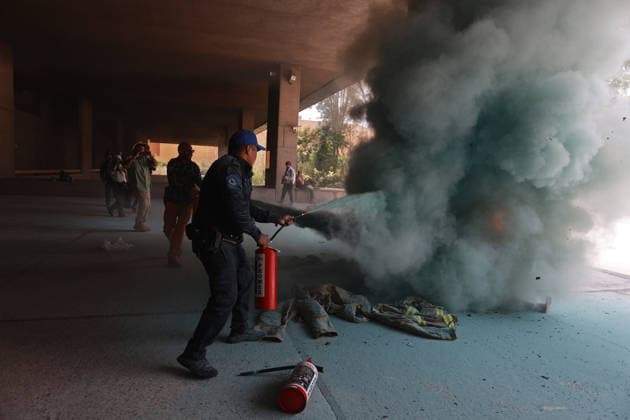 CNTE teachers hold third day of protests in Mexico City after declaring indefinite national strike MEXICO CITY, MEXICO - JUNE 03: Police officers use a fire extinguisher to put out flames in a firefighter equipment storage area at Mexico s Education Ministry building during a protest by CNTE teachers, in Mexico City, Mexico on June 03, 2026. Members of National Coordination of Education Workers (CNTE) forced their way into Mexico s Education Ministry building, causing damage to the facilities, as part of the third day of protests following the declaration of a national strike. Daniel Cardenas Anadolu Mexico City Mexico. Editorial use only. Please get in touch for any other usage.  Copyright: x2026xAnadoluxDanielxCardenasx
