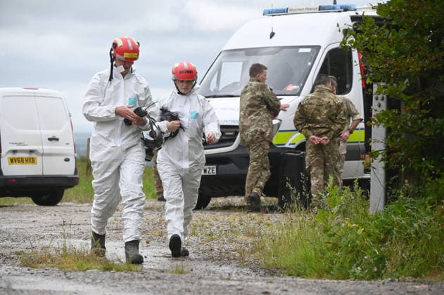 Royal Navy Helicopter Crash Devon 3rd June 2026. Three Royal Navy crew members died when their helicopter crashed into a field in Devon. They were taking part in a training exercise in the Royal Navy Merlin Mk4 when it crashed at Sourton Down, near Okehampton, Devon. Pictured: the crash site with Royal Navy personnel and emergency services in attendance.  Copyright: xWaynexperryx NINTCHDBPICT001085762889