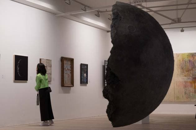 Preview of The Sun and The Moon: Art Inspired by the Celestial exhibition in London LONDON, UNITED KINGDOM - JUNE 4: A woman observes installations during the press preview of The Sun and The Moon: Art Inspired by the Celestial exhibition by British artist Luke Jerram at the Saatchi Gallery in London, United Kingdom on June 4, 2026. Rasid Necati Aslim Anadolu London United Kingdom. Editorial use only. Please get in touch for any other usage.  Copyright: x2026xAnadoluxRasidxNecatixAslimx