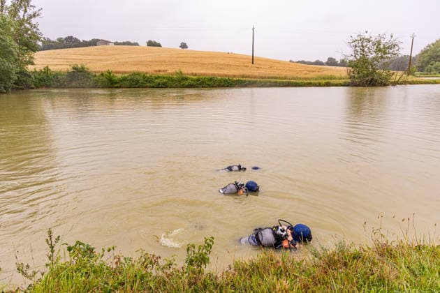 Gendarmerie Diving Team Searches Lake near Urdens For Missing Girl Lyhanna - Fleurance Professional divers from Marseillant work conduct an underwater search with gendarmerie on a lake near Urdens in the area surrounding Fleurance, Gers, France on June 4, 2026, as the search for 11-year-old Lyhanna, who disappeared on May 29 in the Fleurance area, continues to mobilize significant investigative resources; a major development in the judicial inquiry saw suspect Jerome Barella, 41, charged and placed in pre-trial detention on suspicion of kidnapping and illegal confinement of a minor under the age of 15. Photo by I Bazin ABACAPRESS.COM Fleurance URDENS France  Copyright: xIxBazin ABACAx