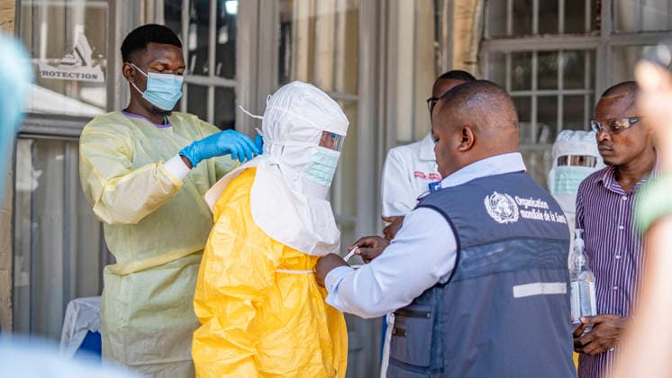 (260604) -- GOMA, June 4, 2026 () -- A medical worker puts on a protective suit in Goma, the Democratic Republic of the Congo (DRC), on June 4, 2026. TO GO WITH Roundup: DR Congo s Ebola cases hit 363, as Uganda reports 4 recoveries () DR CONGO-GOMA-EBOLA OUTBREAK-WHO Xinhua 