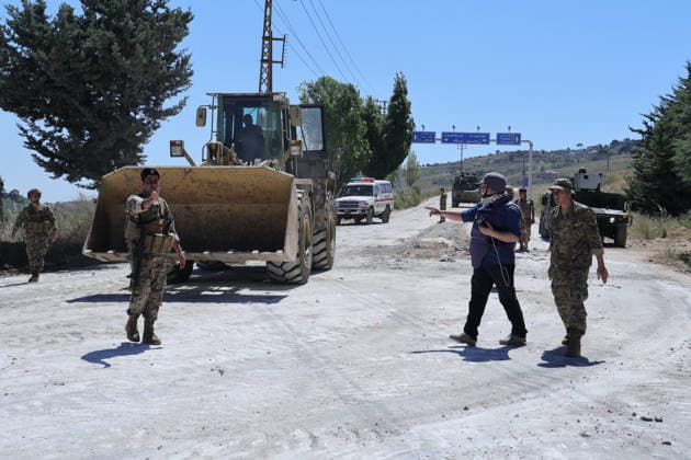 Lebanese Army announced that it has deployed to the town of Dibbin NABATIEH, LEBANON - JUNE 04: Israeli Army engineering vehicles clears the road by removing piles of dirt and rubble as the Lebanese Army announced that it had entered, where Israeli forces had recently withdrawn after carrying out attacks in the town of Dibbin, Nabatieh, Lebanon, on June 04, 2026. Ramiz Dallah Anadolu Nabatieh Lebanon. Editorial use only. Please get in touch for any other usage.  Copyright: x2026xAnadoluxRamizxDallahx
