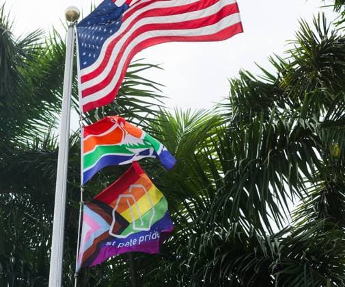 June 4, 2026, St. Petersburg, Florida, USA: The St. Pete Pride Flag, at bottom, blows in the wind along with the America Flag and the City of St. Pete Flag during the Pride Flag Raising event to kick off Pride month at St. Pete City Hall on Thursday, June 4, 2026 in St. Petersburg. St. Petersburg USA - ZUMAs70_ 20260604_zan_s70_012 Copyright: xDirkxShaddx