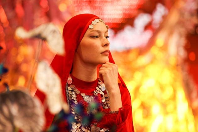 RUSSIA, ST PETERSBURG - JUNE 4, 2026: A young woman in an ethnic costume is seen by a stand of the Bashkortostan Republic at the 2026 St Petersburg International Economic Forum at the ExpoForum Convention and Exhibition Centre. Donat Sorokin TASS  93361365