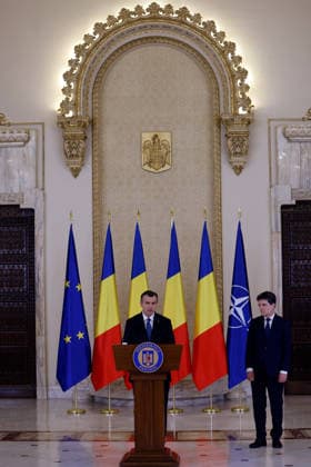 (260604) -- BUCHAREST, June 4, 2026 -- Romania s prime minister-designate Eugen Tomac (L) delivers a speech after being nominated by President Nicusor Dan as Nicusor Dan stands by at Cotroceni palace in Bucharest, Romania, on June 4, 2026. Romanian President Nicusor Dan on Thursday nominated his adviser Eugen Tomac as prime minister-designate. (Photo by Xinhua) ROMANIA-BUCHAREST-PM-DESIGNATE CristianxCristel 