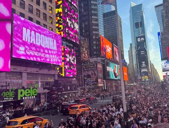 June 4, 2026, New York, New York, USA: Signage and a view of the crowd for the Madonna surprise pop up concert partnered with the app Grindr in Time Square to promote her new album Confessions ll also called Confessions on the Dance Floor - Part ll. New York USA - ZUMAk03_ 20260604_zaf_k03_058 Copyright: xNancyxKaszermanx