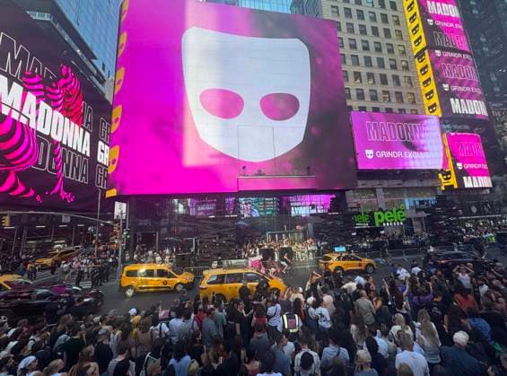 June 4, 2026, New York, New York, USA: Signage and a view of the crowd for the Madonna surprise pop up concert partnered with the app Grindr in Time Square to promote her new album Confessions ll also called Confessions on the Dance Floor - Part ll. New York USA - ZUMAk03_ 20260604_zaf_k03_060 Copyright: xNancyxKaszermanx
