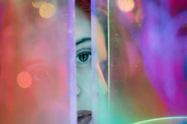 Abstract portrait of partial face looking through neon glass model released, Symbolfoto, GMLF01722