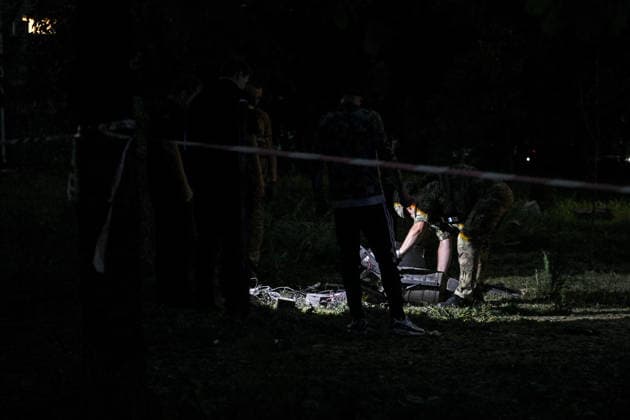 A law enforcer examines Russian drone debris that touched down in a residential area in the Shevchenkivskyi district of Zaporizhzhia, Ukraine, June 4, 2026. Russian forces launched a drone strike on one of the city’s residential areas, killing one person and injuring 16 others. The blast wave and debris shattered windows and balconies in apartment blocks. (Photo by Dmytro Smolienko Ukrinform) Russian forces launch drone strike on district in Zaporizhzhia  Copyright: xDmytroxSmolienkox