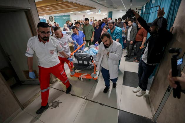 Palestinian Baby Wounded Hebron West Bank Palestinian medics rush a wounded baby on a stretcher through a hospital corridor in Hebron in the occupied West Bank, on June 5, 2026. A seven-month-old baby was critically wounded and his parents were injured during an Israeli military operation in the Wadi al-Hariya area. Hebron West Bank Palestinian Territories Copyright: xMosabxShawerx