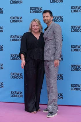 Rivals mid season finale screening with cast & crew in London, UK - 5 Jun 2026 L-R Claire Rushbrook and David Tennant arrive on the red carpet for the Rivals series 2 mid season finale screening at the Barbican London as part of the SXSW festival. Actors and creatives arrived on red carpet and joined the SXSW audience to watch the mid season finale before taking to the stage for a special cast & crew panel. London United Kingdom Copyright: xBonniexBritainx xSOPAxImagesx YXJ04717