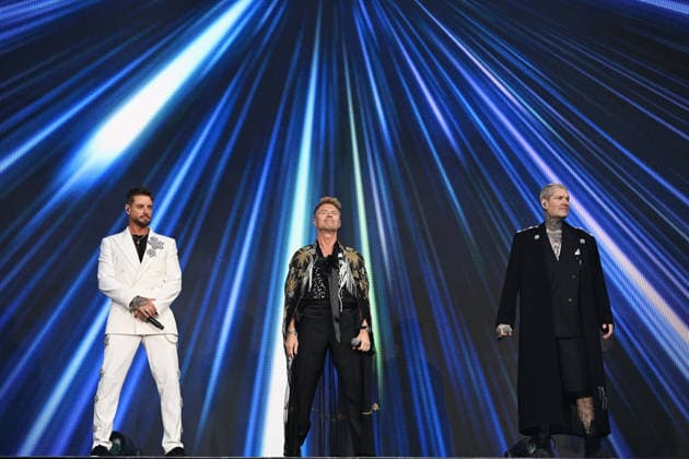 Boyzone performing at Emirates Stadium LONDON, ENGLAND - JUNE 05: Keith Duffy, Ronan Keating and Shane Lynch of ˜Boyzone™ performing at Emirates Stadium on June 05, 2026 in London, England CAP MAR MAR Great Britain UK Copyright: xMartinxHarris CapitalxPicturesx
