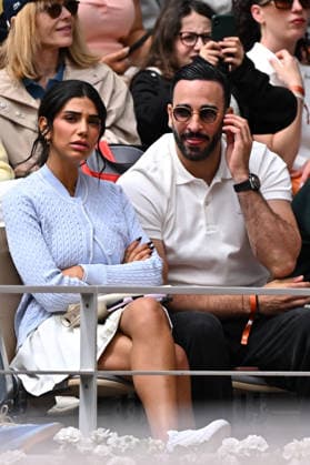 French Open - Adil Rami and Louana Franco in the Stands French former football player Adil Rami (R) and Belgian internet personnality Louana Franco watch Germany s Alexander Zverev playing against Czech Republic s Jakub Mensik during their men s semi final singles match on day 13 of the French Open tennis tournament on Court Philippe-Chatrier at the Roland-Garros Complex in Paris on June 5, 2026. Photo by Corrine Dubreuil ABACAPRESS.COM Paris France  Copyright: xDubreuilxCorinne ABACAx