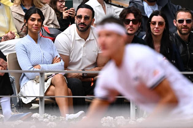 French Open - Adil Rami and Louana Franco in the Stands French former football player Adil Rami (R) and Belgian internet personnality Louana Franco watch Germany s Alexander Zverev playing against Czech Republic s Jakub Mensik during their men s semi final singles match on day 13 of the French Open tennis tournament on Court Philippe-Chatrier at the Roland-Garros Complex in Paris on June 5, 2026. Photo by Corrine Dubreuil ABACAPRESS.COM Paris France  Copyright: xDubreuilxCorinne ABACAx