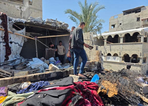 Palestinians Inspect Site of Deadly Strike in Khan Younis Palestinians inspect the damage at the site of an Israeli strike that targeted a tent belonging to the family of Mohannad Farwana on the rooftop of their home in central Khan Younis, southern Gaza Strip, on June 6, 2026. Farwana was killed after the tent caught fire in the strike, just hours before his scheduled wedding ceremony. Photo by Tariq Mohammad APA Images Khan Yunis Gaza Strip Palestinian Territory 060626_Khan_Yunis_TM_00(29) Copyright: xapaimagesxTariqxMohammad xapaimagesx