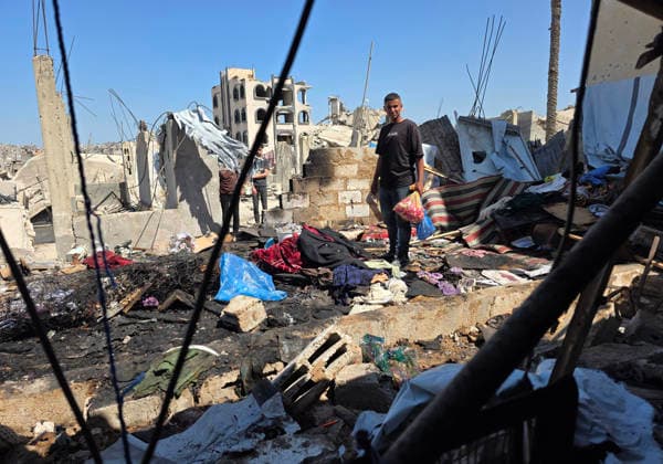 Palestinians Inspect Site of Deadly Strike in Khan Younis Palestinians inspect the damage at the site of an Israeli strike that targeted a tent belonging to the family of Mohannad Farwana on the rooftop of their home in central Khan Younis, southern Gaza Strip, on June 6, 2026. Farwana was killed after the tent caught fire in the strike, just hours before his scheduled wedding ceremony. Photo by Tariq Mohammad APA Images Khan Yunis Gaza Strip Palestinian Territory 060626_Khan_Yunis_TM_00(34) Copyright: xapaimagesxTariqxMohammad xapaimagesx