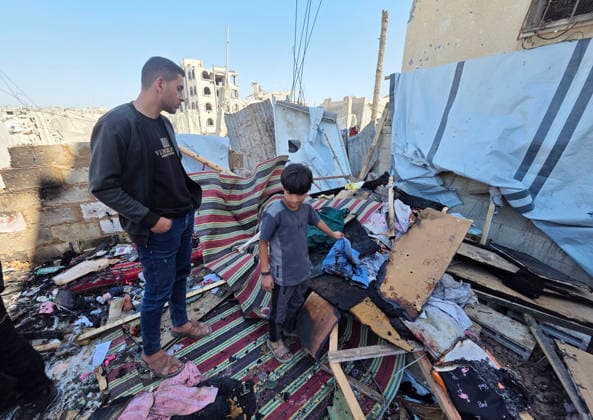 Palestinians Inspect Site of Deadly Strike in Khan Younis Palestinians inspect the damage at the site of an Israeli strike that targeted a tent belonging to the family of Mohannad Farwana on the rooftop of their home in central Khan Younis, southern Gaza Strip, on June 6, 2026. Farwana was killed after the tent caught fire in the strike, just hours before his scheduled wedding ceremony. Photo by Tariq Mohammad APA Images Khan Yunis Gaza Strip Palestinian Territory 060626_Khan_Yunis_TM_00(5) Copyright: xapaimagesxTariqxMohammad xapaimagesx
