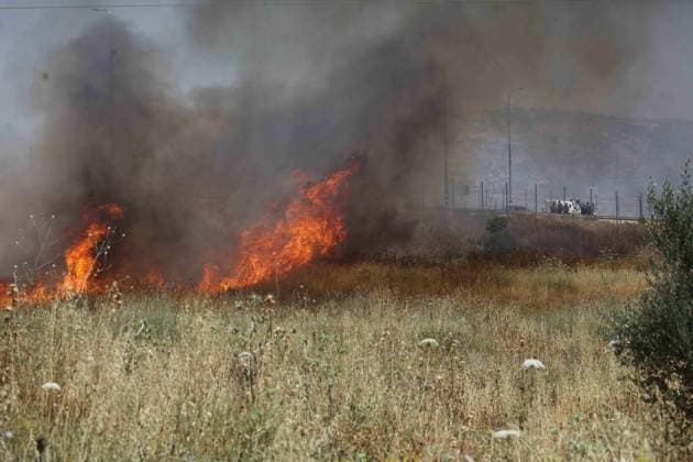 Israeli settlers set fire to Palestinians agricultural fields in the West Bank NABLUS, WEST BANK, PALESTINE - JUNE 06: Palestinians attempt to extinguish the fire using their own means after Israeli settlers set fire to agricultural fields belonging to Palestinians in the town of Huwara, near Nablus, West Bank, Palestine on June 06, 2026. Nedal Eshtayah Anadolu Nablus West Bank. Editorial use only. Please get in touch for any other usage.  Copyright: x2026xAnadoluxNedalxEshtayahx