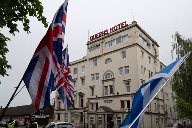 June 6, 2026, Perth, Scotland, UK: Anti-immigration protesters held a demonstration outside The Queens Hotel in Perth, while pro-immigration protesters aligned with Perth Against Racism staged a Reject Hate And Division counter-demonstration outside the Radisson Blu Hotel opposite. Both hotels are being used to house asylum seekers and have been the focus of similar protests in recent months. Perth UK  - ZUMAs357 20260606_zip_s357_006 Copyright: xCameronxScottx
