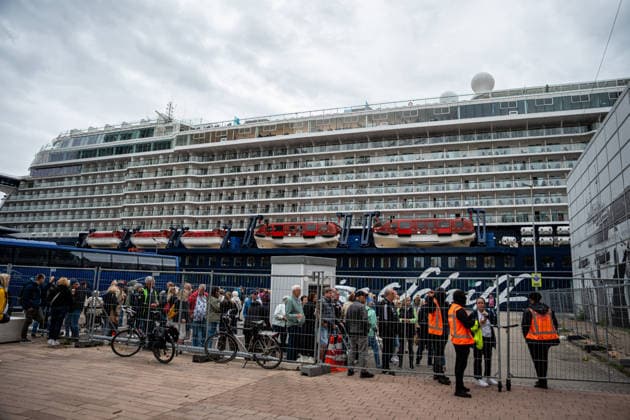 June 6, 2026, Rotterdam, South Holland, Netherlands: Rotterdam, Netherlands, 6 June 2026. Extinction Rebellion activists blocked the entrance to the Cruise Terminal on the Wilhelminakade on World Anti-Cruise Day. This temporarily preventing cruise passengers from boarding a moored cruise ship. Several activists were detained and four were arrested. Rotterdam Netherlands  - ZUMAp202 20260606_zip_p202_012 Copyright: xJamesxPetermeierx