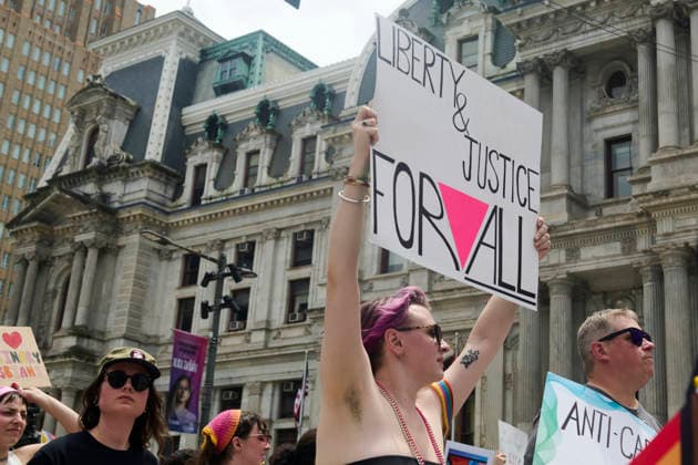 June 6, 2026, Philadelphia, Pennsylvania, USA: People march past City Hall in downtown Philadelphia to protest civil rights abuses against those who identify as LGBTQIA2S+ as part of the annual 2026 Philadelphia Dyke March. Philadelphia, PA, June 5, 2026. Philadelphia USA - ZUMAg216 20260606_znp_g216_013 Copyright: xDominicxGwinnx
