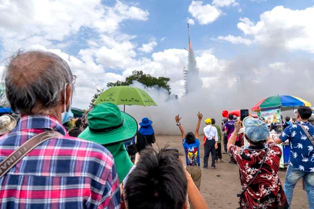June 7, 2026, Suwwanaphum, Roi Et, Thailand: Spectators watch the launch of a sen (100,000) class rocket during the annual bun bang fai rocket festival in Suwwanaphum, Roi Et province, Thailand. Rocket festivals, known as bun bang fai, take place in May and June in ThailandÃ¢â‚¬â ¢s northeast Issan region and involve launching traditional rockets in order to beseech the god Phaya Thaen to bring rain at the start of the rice growing season. Suwwanaphum Thailand - ZUMAt128 20260607_zap_t128_003 Copyright: xAdryelxTalamantesx