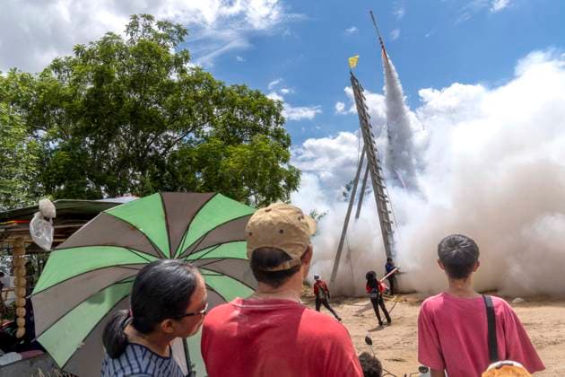June 7, 2026, Suwwanaphum, Roi Et, Thailand: Spectators watch the launch of a sen (100,000) class rocket during the annual bun bang fai rocket festival in Suwwanaphum, Roi Et province, Thailand. Rocket festivals, known as bun bang fai, take place in May and June in ThailandÃ¢â‚¬â ¢s northeast Issan region and involve launching traditional rockets in order to beseech the god Phaya Thaen to bring rain at the start of the rice growing season. Suwwanaphum Thailand - ZUMAt128 20260607_zap_t128_004 Copyright: xAdryelxTalamantesx