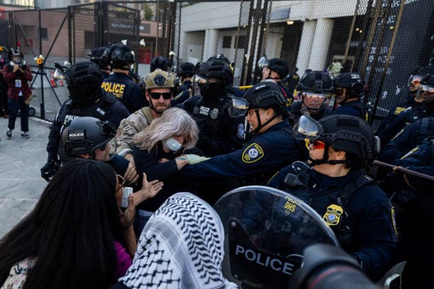 LOS ANGELES, CA - JUNE 06: A protester is arrested by police officers outside a federal detention center during an anti-ICE protest on June 6, 2026 in Los Angeles, California.  Copyright: xVCGx 111646651194