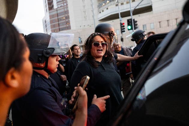 LOS ANGELES, CA - JUNE 06: A protester is arrested by police officers outside a federal detention center during an anti-ICE protest on June 6, 2026 in Los Angeles, California.  Copyright: xVCGx 111646651197